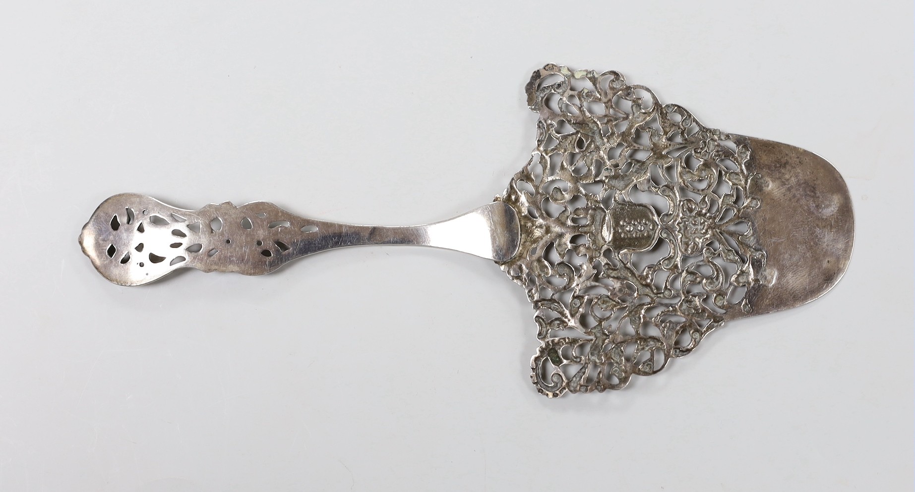 A 19th century Dutch? ornate pierced white metal server, 21.1cm.